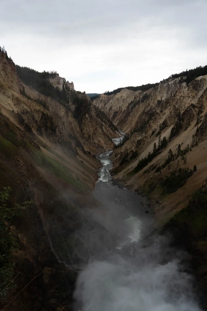A waterfall descending into the Yellowstone canyon